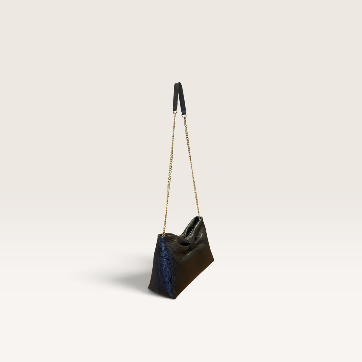 Borsa con tracolla in pelle martellata