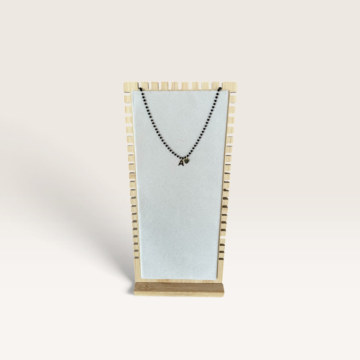 Collana con pietre nere e Lettera Cloel