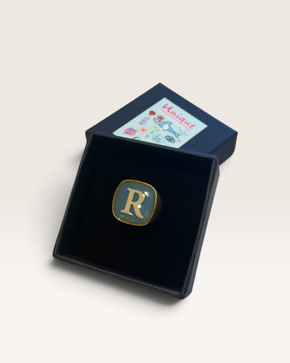 Anello con iniziale UNIQUE