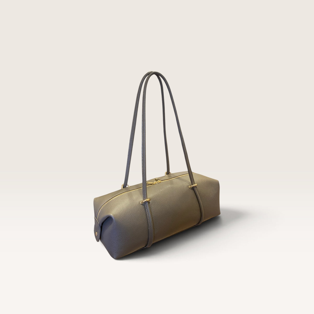 Bauletto in pelle martellata