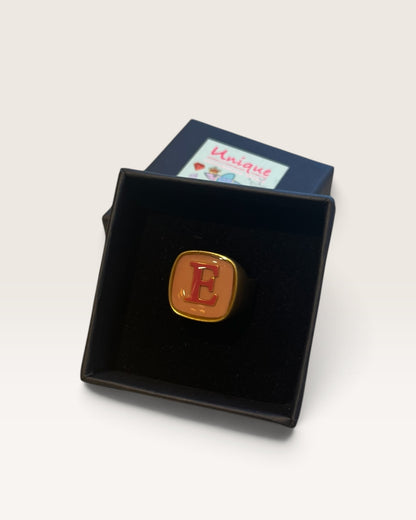 Anello con iniziale UNIQUE