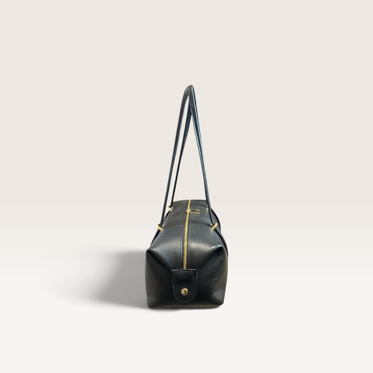 Bauletto in pelle martellata
