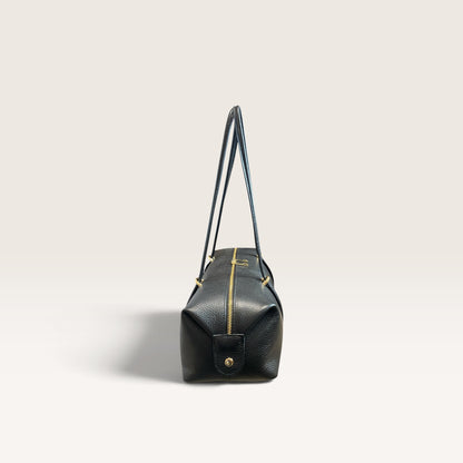 Bauletto in pelle martellata