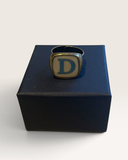 Anello con iniziale UNIQUE