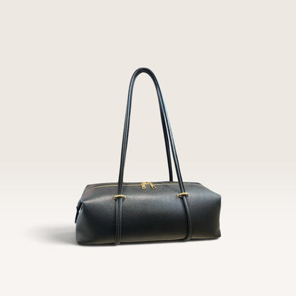 Bauletto in pelle martellata