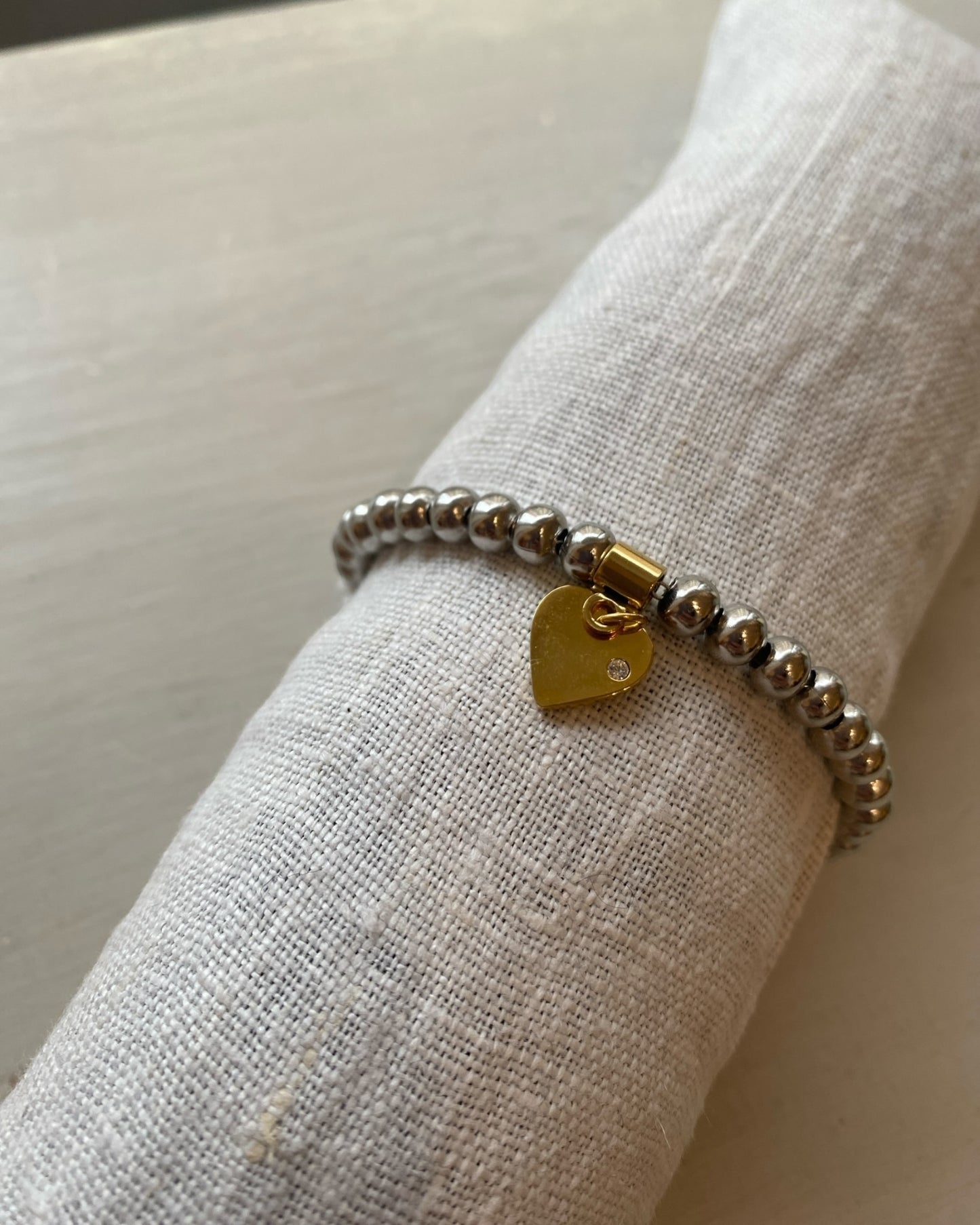 Bracciali con perline argento e accessorio oro CLOEL