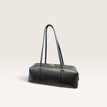 Bauletto in pelle martellata