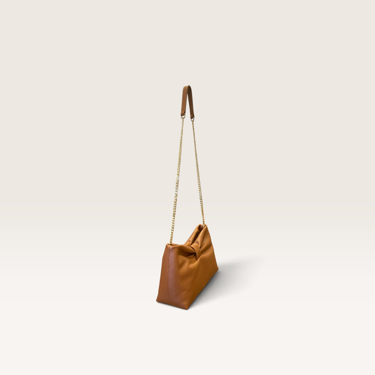 Borsa con tracolla in pelle martellata