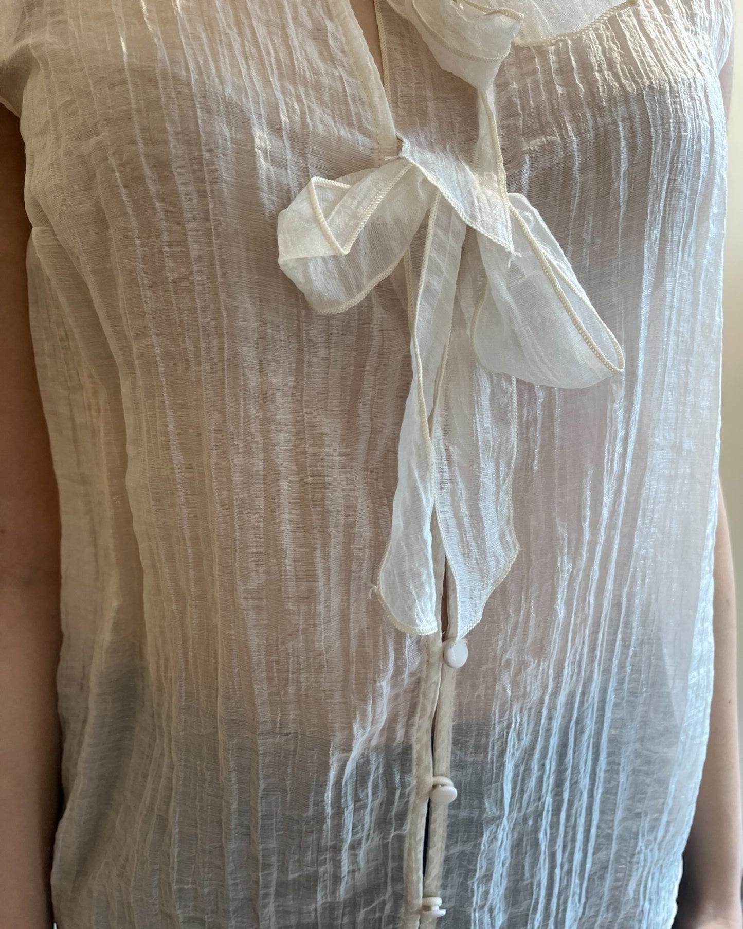 Camicia smanicata con fiocchi davanti art. S22XBF LEJANO Sandro FERRONE