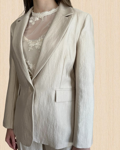 Tailleur giacca monopetto + pantalone palazzo e cintura in ecopelle TENSIONE IN