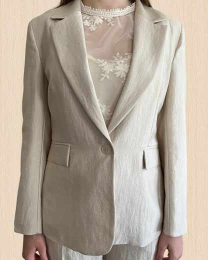 Tailleur giacca monopetto + pantalone palazzo e cintura in ecopelle TENSIONE IN