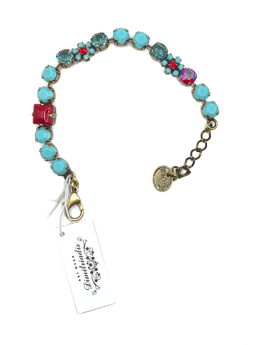 Bracciale con cristalli turchesi e dettagli rossi DIMITRIADIS